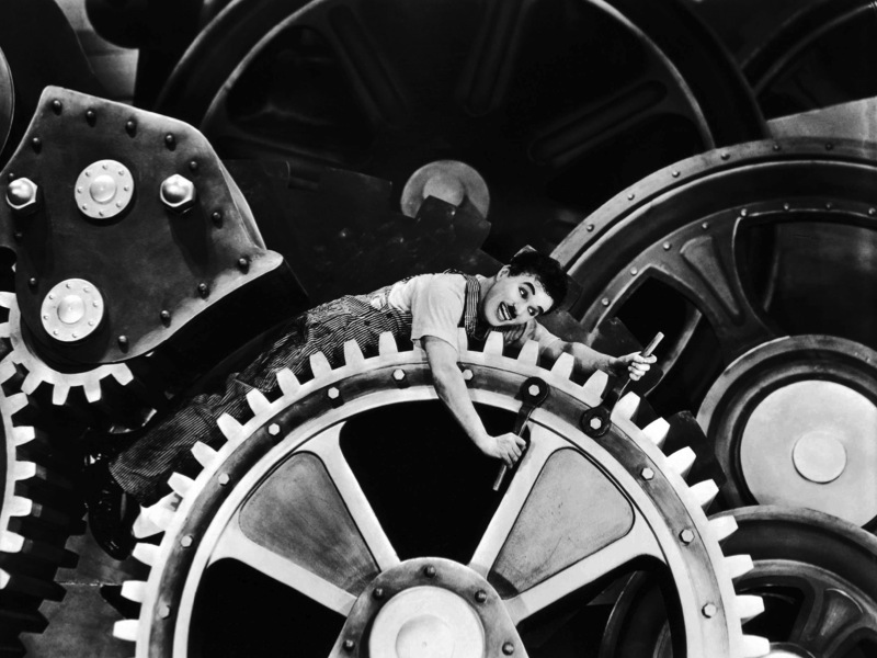 filme Tempos Modernos (1936), dirigido por Charlie Chaplin