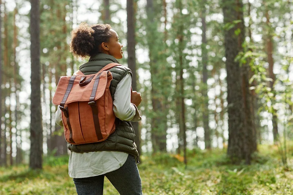 Woman hiking in forest